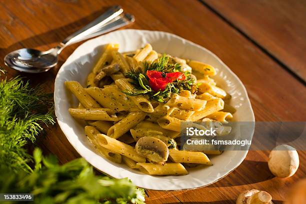 Peste Sauce Penne With Mushrooms Stock Photo - Download Image Now - Basil, Bowl, Close-up