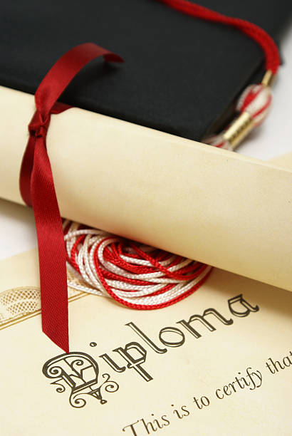 istock A diploma and a graduation of red and white 153833586