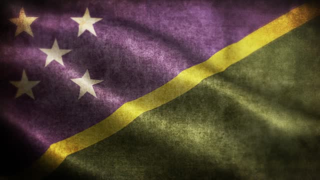 Closeup of grunge The Solomon Islands waving flag loopable stock video