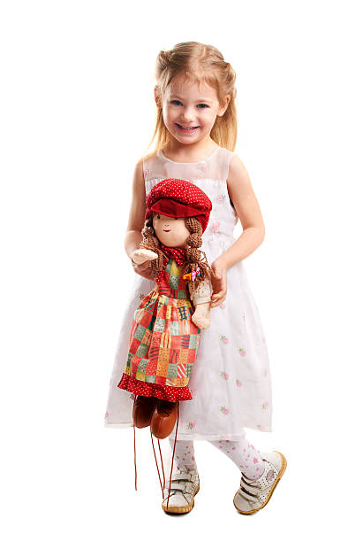 istock little girl with doll 153837591