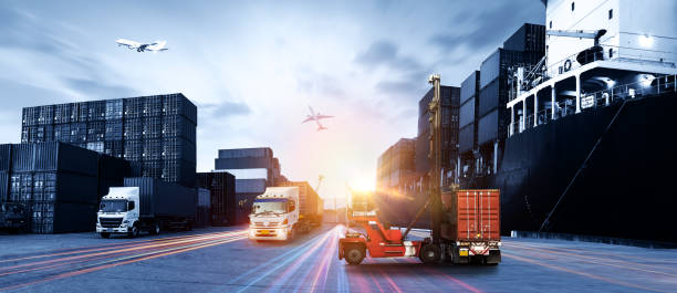 istock Logistics and transportation of Container Cargo ship and Cargo plane with working crane bridge in shipyard at sunrise, logistic import export and transport industry background 1538532733