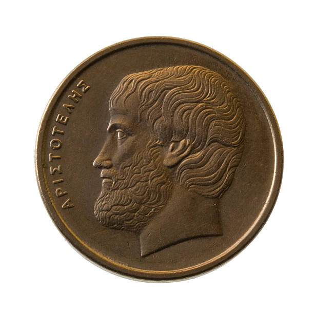 Aristotle, ancient Greek philosopher Aristotle, ancient Greek philosopher, portrait on a 5 drachmas coin (1990) isolated on white ancient coins of greece stock pictures, royalty-free photos & images