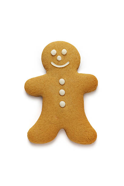 Smiling gingerbread man on white background stock photo