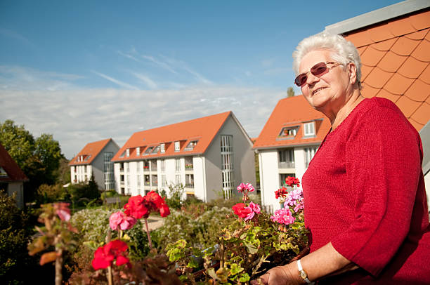 istock old woman on the balcony 153858918