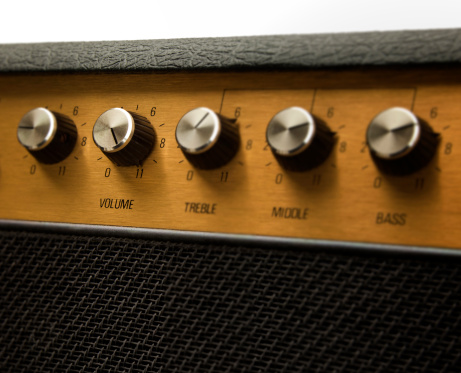 Guitar amplifier with volume control set at eleven