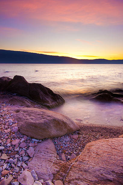 peacefull sunrise on the Garda Lake. Long exposure.