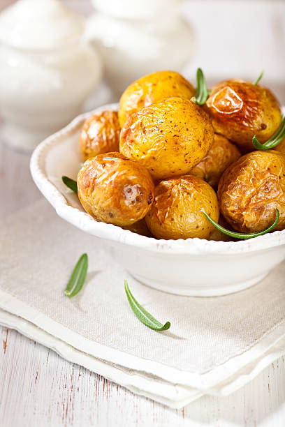 istock Oven baked potatoes with rosemary 153864114