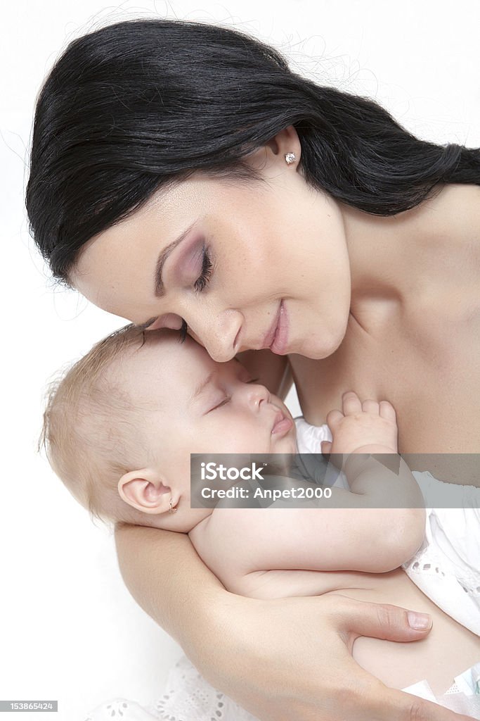 picture of happy mother with baby over white Adult Stock Photo