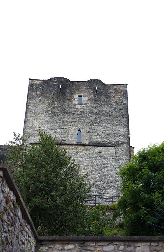 Morestel, France: Medieval Tower with Isere Flag with Dolphin