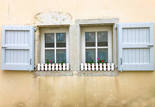 Morestel, France: Charming Window with Gray Shutters