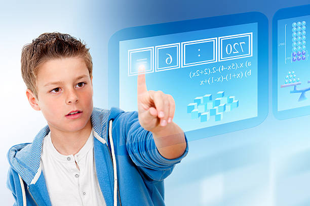 joven estudiante con interfaz futurista virtual. - mathematics mathematical symbol preschool simplicity fotografías e imágenes de stock