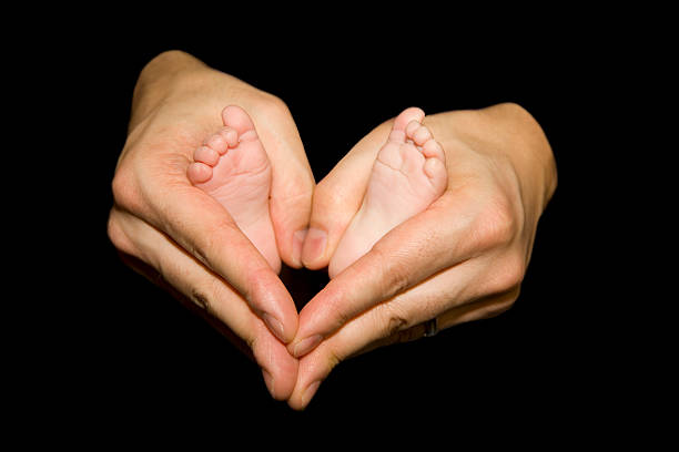 Baby Holding Mothers Hand