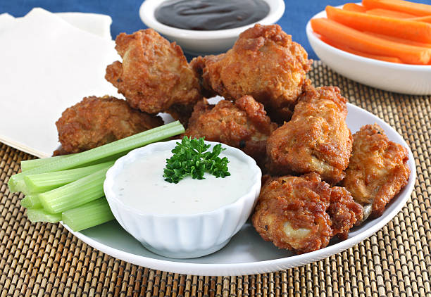 istock Fresh Chicken Wings with Vegetables and Sauce 153868393