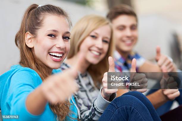 Three Friends With Thumbs Up Stock Photo - Download Image Now - Adult, Beautiful People, Beauty