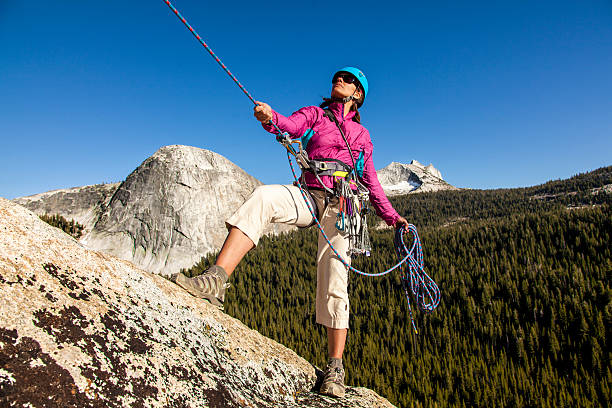 Woman climbing the mountain