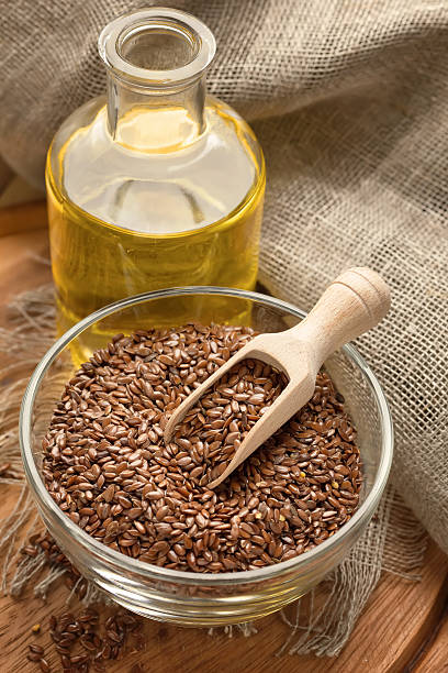 istock Linseed oil and flax seeds 153872875