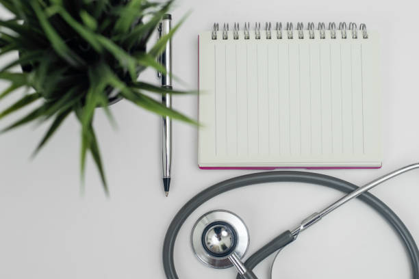 blank notebook with stethoscope white background. heart and healthcare concept. diagnostic, disease, cardiology. equipment research of physician for treatment patient. - doctor electronic organizer healthcare and medicine patient imagens e fotografias de stock
