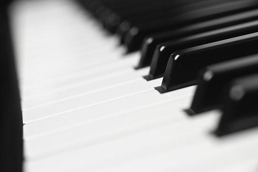 Keys of a piano keyboard, shallow DOF.
