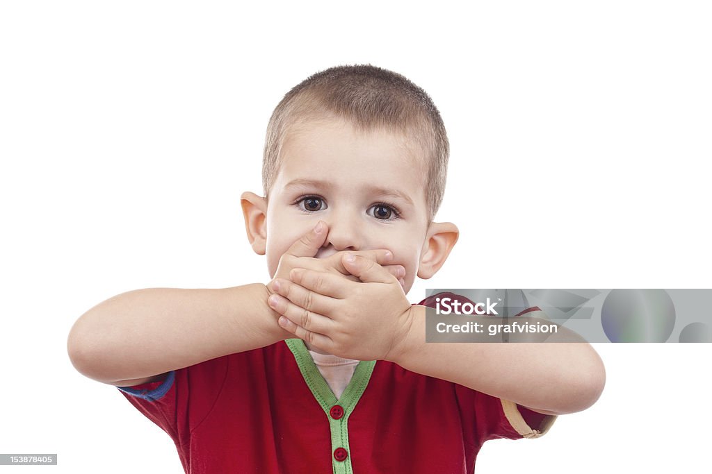 Little boy Little boy covering her mouth with her hand Child Stock Photo