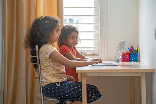 5 Girls Using Computer Two Elementary School Girls Using Computer At Home Stock Photo ...