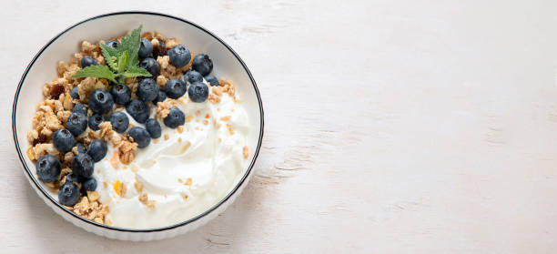 istock Healthy breakfast, cereal with berries and yogurt. 1538819561