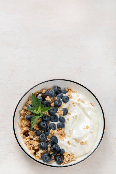 istock Healthy breakfast, cereal with berries and yogurt. 1538824183