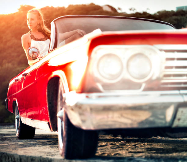istock Woman in car watching sunset 153886469