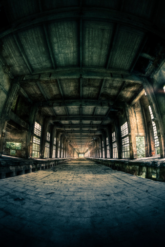 Abandoned Old Ruined Factory. Vertical shot.