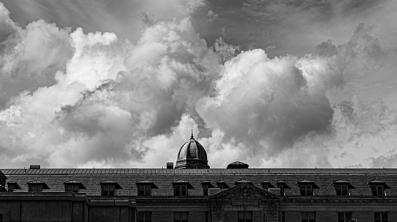 Annapolis, MD, USA- Rooftop with a dome under the cloudy sky in black and white
