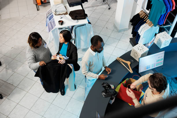 Customers waiting at checkout desk