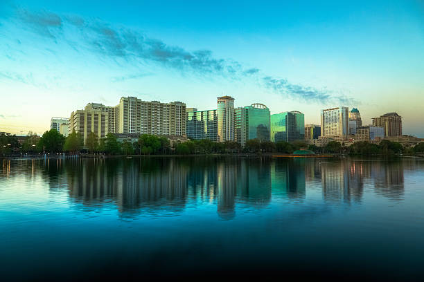 istock Orlando Skyline at Sunrise seen from Lake Eola. 153888318