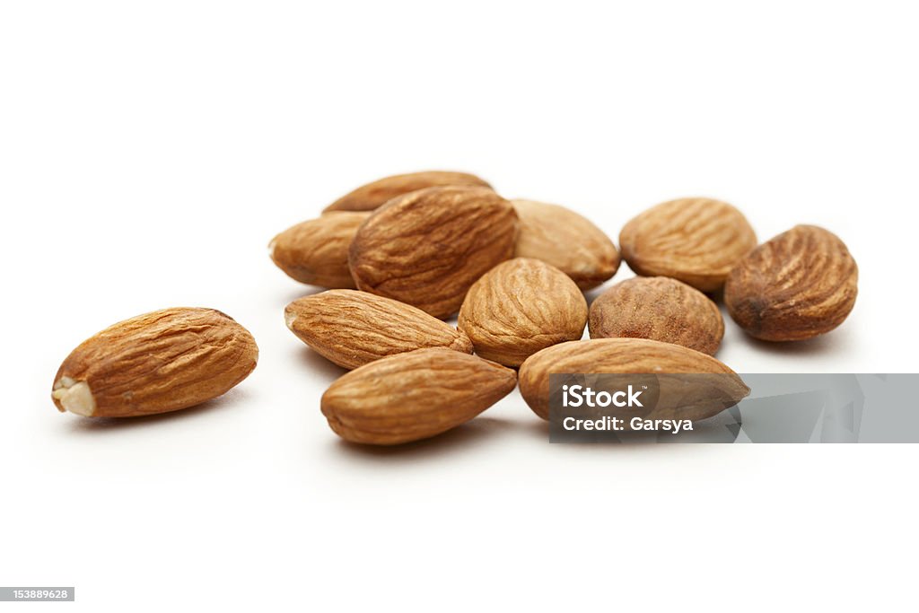 Almonds on the white background Almond Stock Photo