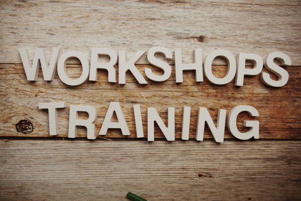 istock Workshops Training alphabet letters on wooden background 1538905912