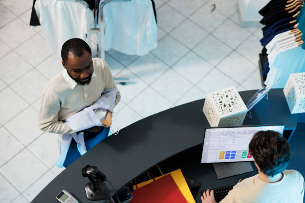 istock Buyer standing at checkout top view 1538910193
