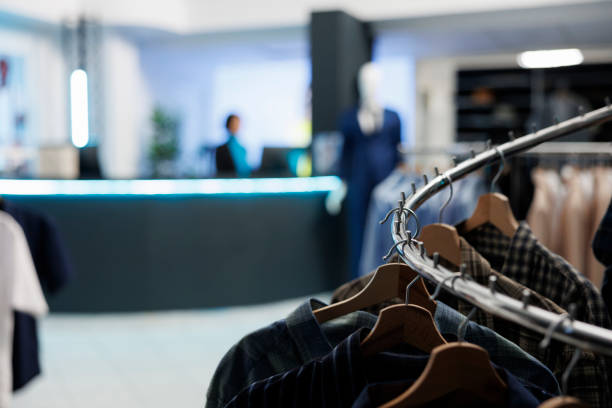 Clothes on hangers as unlabelled product shot of jumpers and T-shirts