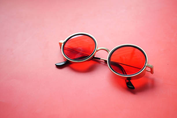 istock a red Round sunglasses on red background 1538916472