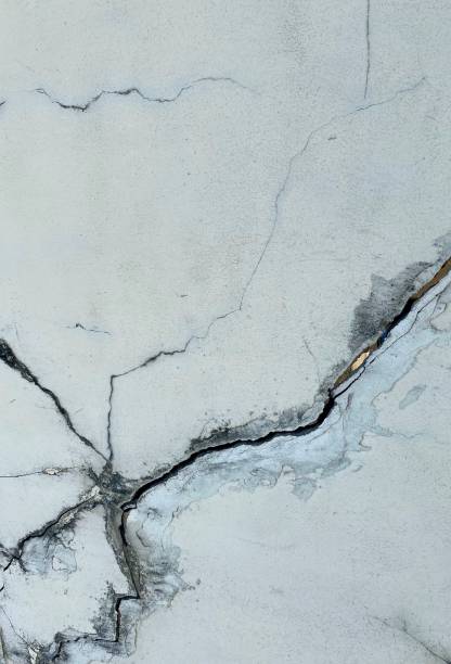 istock quill pen on a white marble slab with cracks and cracks. 1538927002