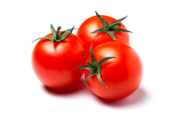 Three red tomatoes Cherry tomatoes isolated on white background cherry tomato stock pictures, royalty-free photos & images