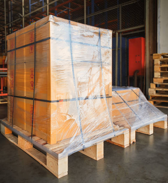 istock Package Boxes Wrapped Plastic Stacked on Pallets. Warehouse Shipping, Distribution Storehouse, Shipment Boxes, Supply Chain, Cargo Supplies Warehouse Logistic. 1538951544