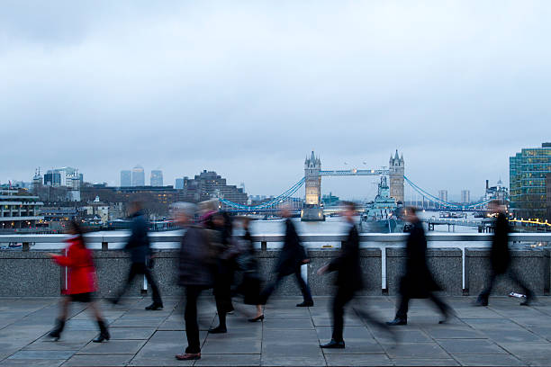 Early morning rush hour, financial sector workers going to work in the City of London.