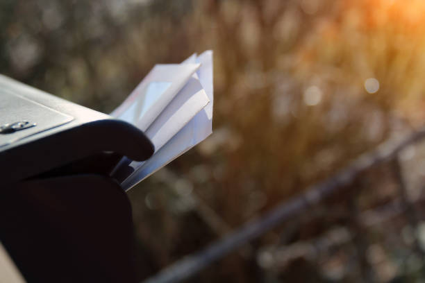 istock Piles  of letters in a  mail box outside. 1538971886