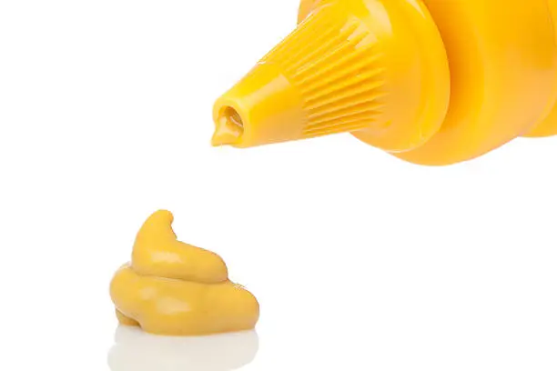 A yellow mustard bottle against a white background