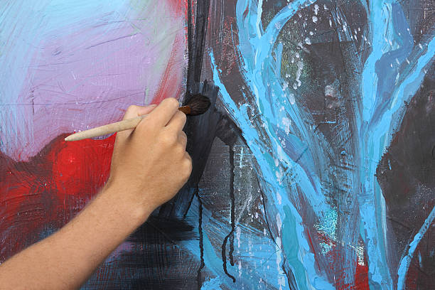 istock man hand painting blue abstract picture 153899274