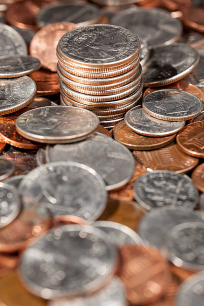 istock Pile of loose US coins in macro 153899759