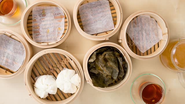 Top view of eating chinese dim sum