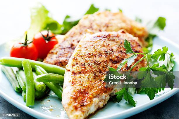 Dinner Of Grilled Chicken Breasts Green Beans And Tomatoes Stock Photo - Download Image Now