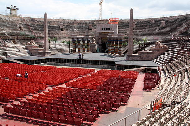 Arena Verona Italy Tourists look at the old Arena of Verona, Italy verona opera stock pictures, royalty-free photos & images