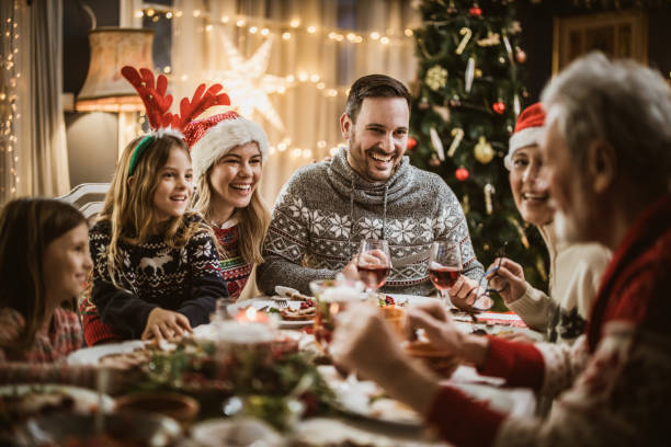 istock Family's New Year's Eve at dining table! 1539067851