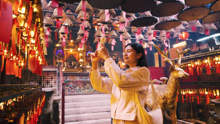 Tourists pay homage to an old temple in Hong Kong Make a wish and pay homage.