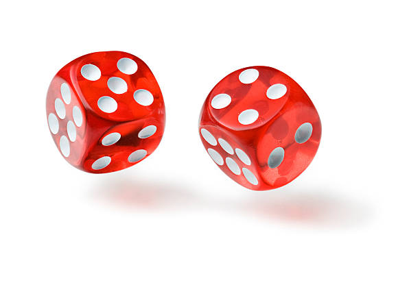 istock Pair of red translucent die in mid air 153908838